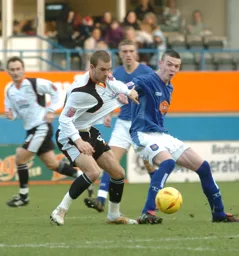 Rowan Vine has his shirt tugged