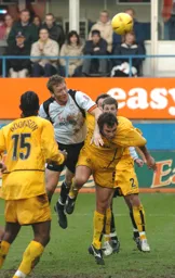 Steve Howard heads for goal