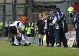 Rowan Vine celebrates with the Luton bench after scoring
