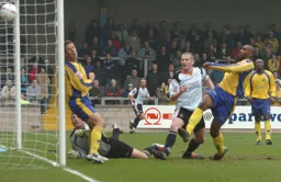 Kevin Nicholls stabs in the Town's first goal