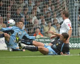 Steven Howard in a goalmouth melee