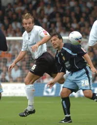 Paul Underwood's header is challenged by a Leeds player
