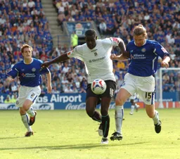 Enoch Showunmi and a Leicester player battle for the ball
