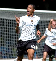 Curtis Davies celebrates his goal