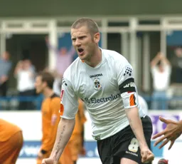 Kevin Nicholls celebrates his goal