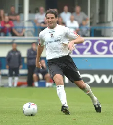 Chris Coyne with the ball