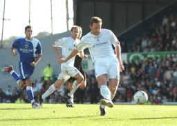 Steven Howard strikes the ball