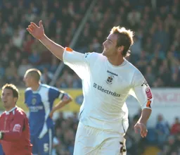 Peter Holmes celebrates his goal