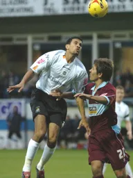 Carlos Edwards wins the header