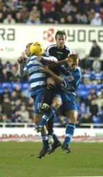 Peter Holmes is sandwiched