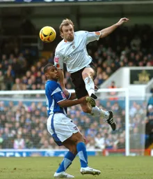 Paul Underwood leaps to win the ball
