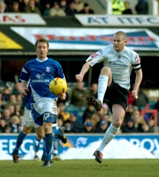 Kevin Nicholls tries to get control of the ball