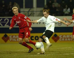 Rowan Vine tries a shot