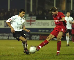 Carlos Edwards challenges Steven Gerrard