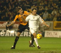 Ahmet Brkovic controls the ball pursued by a Wolves player