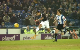 Carlos Edwards unleashes a shot