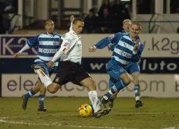 Dean Morgan prepares to shoot to score Luton's third goal