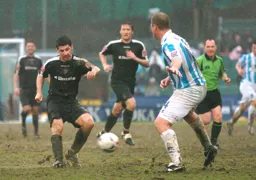 Stephen Robinson slides a ball through the middle