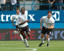 Leon Barnett shows his delight after scoring the first goal. Steve Robinson looks equally pleased