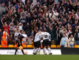 Players and fans celebrate the second goal. They were happy for now, but not for long