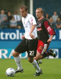 Peter Holmes moves away from Luke Chadwick