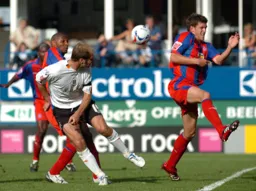 Sam Parkin stoops to send a header towards goal