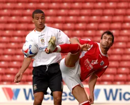 Dean Morgan is challenged with a high boot