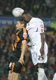 Leon Barnett rises highest