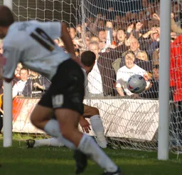 Rowan Vine bundles the ball over the line from close range for Town`s second goal