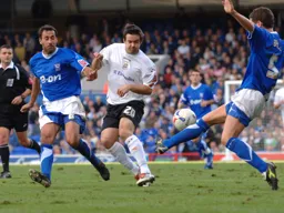 Adam Boyd is blocked by Alex Bruce