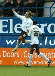 Ahmet Brkovic jumps for joy after scoring the second goal
