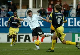 Adam Boyd takes a shot at goal