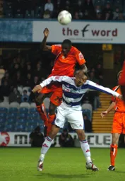 Leon Barnett gets a lift off Dexter Blackstock