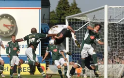 Despite being outnumbered Chris Coyne gives the Plymouth defence a worrying moment