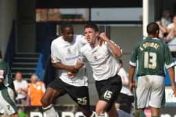 Leon Barnett and Stephen O`Leary celebrate Town`s only goal