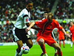 Drew Talbot gets past Lewin Nyatanga