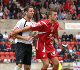 Chris Coyne shepherding the attacker