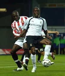 Paul Furlong brings the ball under control