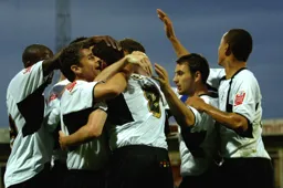 The players celebrate together