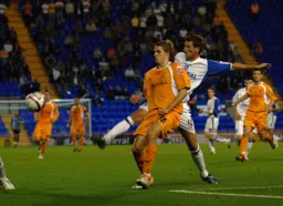 Dave Edwards challenging with former Hatter Paul McLaren