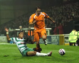 Dave Edwards beats his man