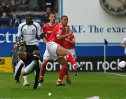 A diving header from Chris Perry gives Luton the lead
