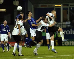 Calvin Andrew and Chris Coyne under pressure