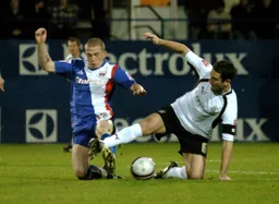 Chris Coyne keeps control of the ball