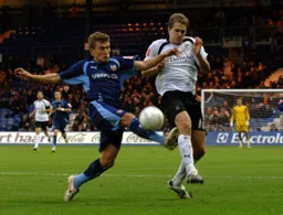 Dave Edwards battling for the ball