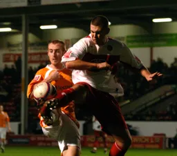 Drew Talbot gets his foot to the ball