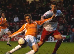 Paul McVeigh stretches for the ball