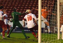 Jaroslaw Fojut attempts to get the ball across the goal