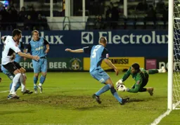 Chris Coyne watches on as the keeper collects