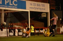 Chris Coyne clears the ball off the line
